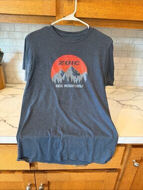 Zoic Men’s Short-Sleeve Graphic Tee in Dark Blue with Red Crest